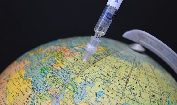Globus mit Impfung